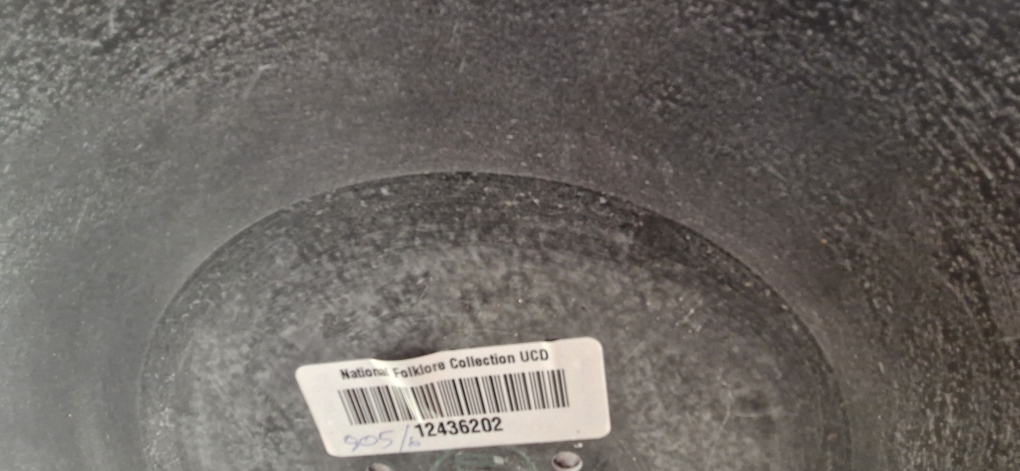 Close-up of palmitic acid and surface deposits on an acetate disc